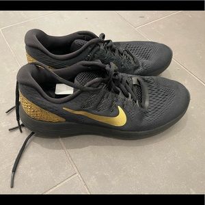 Black and Gold Nike Tennis Shoes